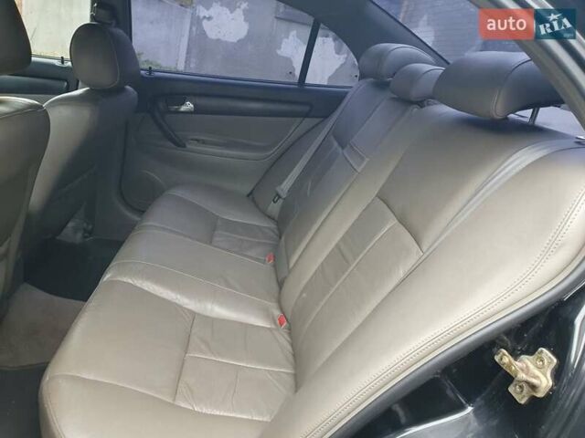 Шевроле Эванда 2006 в Киеве на Automoto.ua Черный Шевроле Эванда, объемом двигателя 2 л и пробегом 229 тыс. км за 3300 $, фото 29 на Automoto.ua