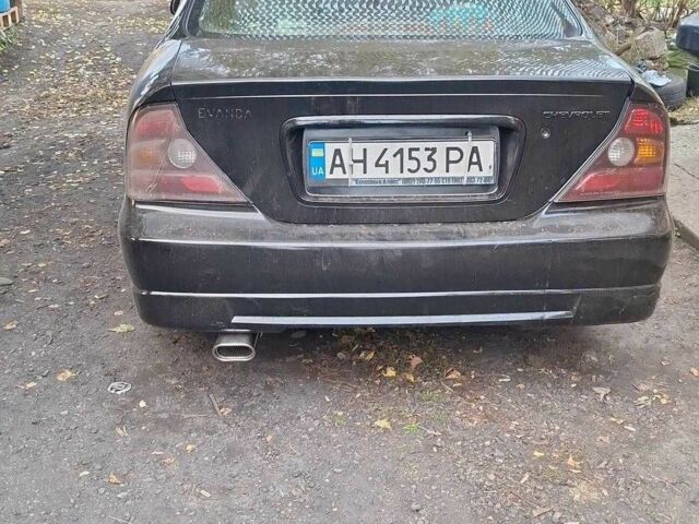 Черный Шевроле Эванда, объемом двигателя 2.5 л и пробегом 215 тыс. км за 3114 $, фото 13 на Automoto.ua