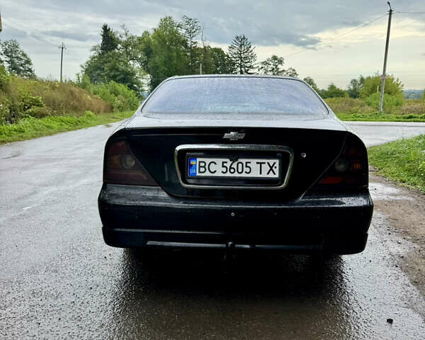 Черный Шевроле Эванда, объемом двигателя 2 л и пробегом 280 тыс. км за 3000 $, фото 4 на Automoto.ua