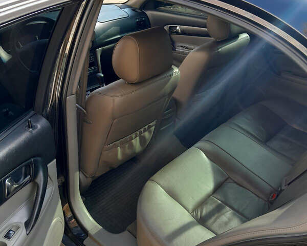 Черный Шевроле Эванда, объемом двигателя 2 л и пробегом 260 тыс. км за 4150 $, фото 6 на Automoto.ua