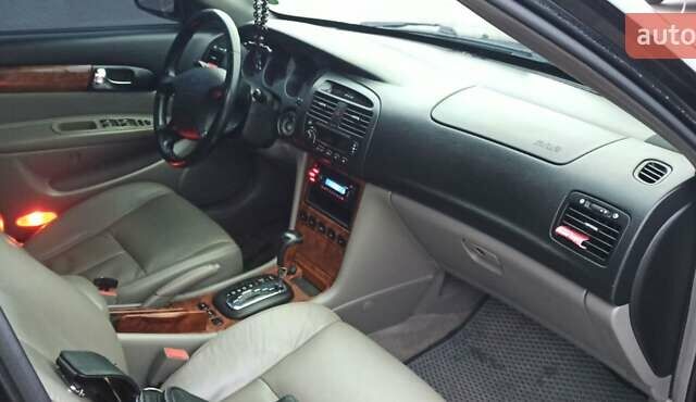 Черный Шевроле Эванда, объемом двигателя 2.49 л и пробегом 298 тыс. км за 3999 $, фото 10 на Automoto.ua