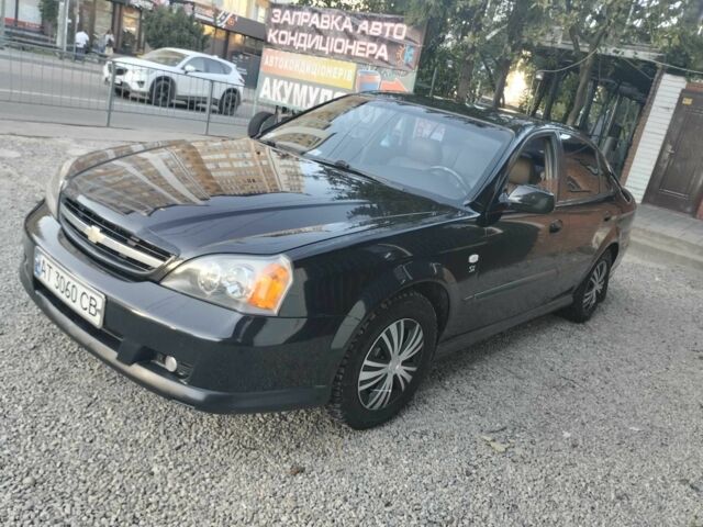 Чорний Шевроле Еванда, об'ємом двигуна 2 л та пробігом 36 тис. км за 3600 $, фото 2 на Automoto.ua