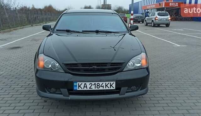 Черный Шевроле Эванда, объемом двигателя 2.49 л и пробегом 298 тыс. км за 3999 $, фото 2 на Automoto.ua