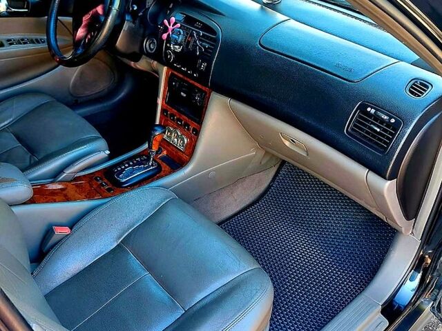 Черный Шевроле Эванда, объемом двигателя 2.5 л и пробегом 142 тыс. км за 4000 $, фото 1 на Automoto.ua