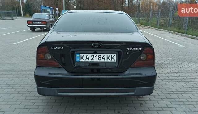 Черный Шевроле Эванда, объемом двигателя 2.49 л и пробегом 298 тыс. км за 3999 $, фото 9 на Automoto.ua