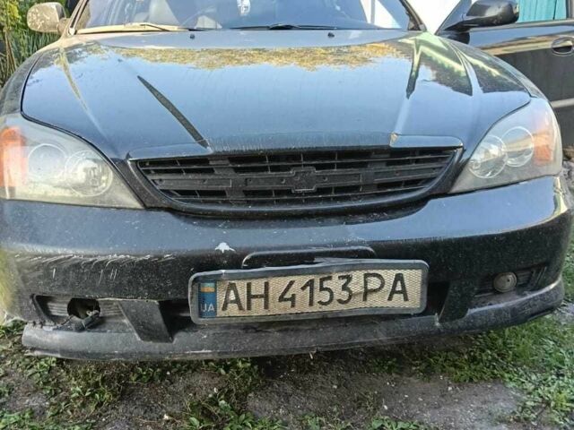 Черный Шевроле Эванда, объемом двигателя 2.5 л и пробегом 215 тыс. км за 3114 $, фото 12 на Automoto.ua