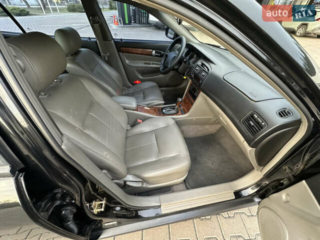 Черный Шевроле Эванда, объемом двигателя 2.5 л и пробегом 165 тыс. км за 3499 $, фото 18 на Automoto.ua