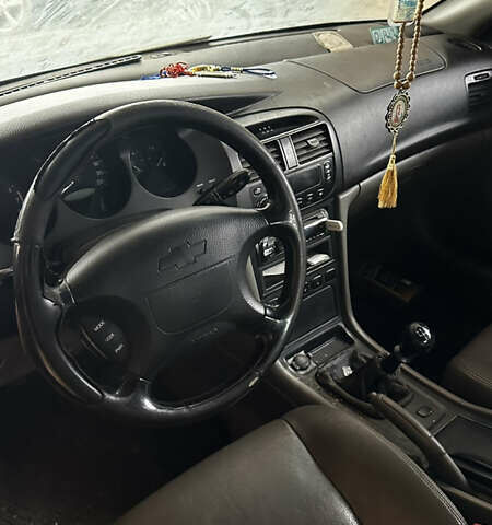 Коричневий Шевроле Еванда, об'ємом двигуна 0 л та пробігом 200 тис. км за 1500 $, фото 4 на Automoto.ua