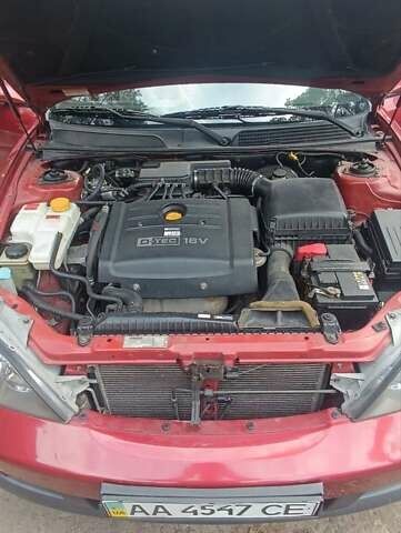 Красный Шевроле Эванда, объемом двигателя 2 л и пробегом 177 тыс. км за 4500 $, фото 13 на Automoto.ua