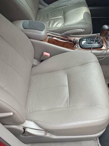 Красный Шевроле Эванда, объемом двигателя 2 л и пробегом 177 тыс. км за 4500 $, фото 5 на Automoto.ua