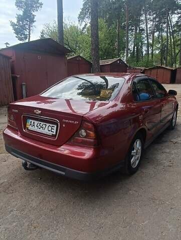 Красный Шевроле Эванда, объемом двигателя 2 л и пробегом 177 тыс. км за 4500 $, фото 3 на Automoto.ua