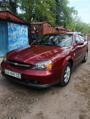 Красный Шевроле Эванда, объемом двигателя 2 л и пробегом 177 тыс. км за 4500 $, фото 1 на Automoto.ua