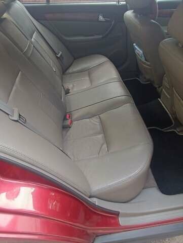 Красный Шевроле Эванда, объемом двигателя 2 л и пробегом 177 тыс. км за 4500 $, фото 6 на Automoto.ua