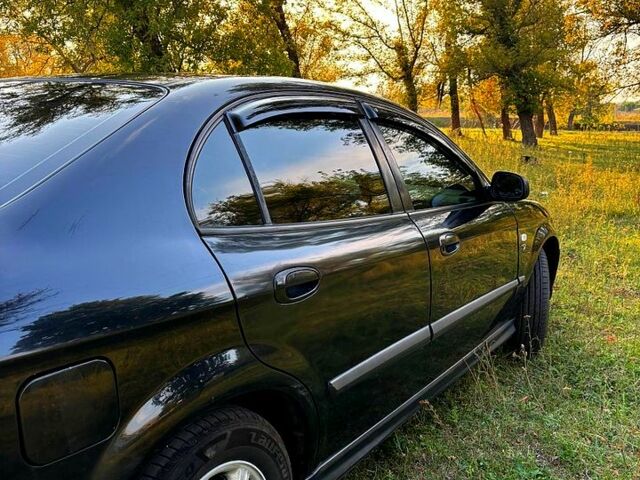 Шевроле Еванда, об'ємом двигуна 2 л та пробігом 250 тис. км за 3000 $, фото 3 на Automoto.ua