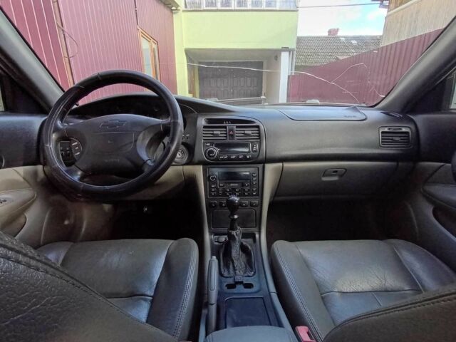 Сірий Шевроле Еванда, об'ємом двигуна 2.5 л та пробігом 357 тис. км за 2520 $, фото 9 на Automoto.ua