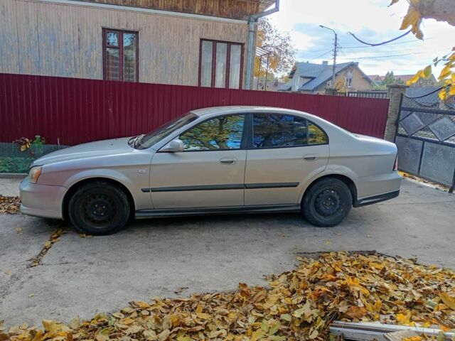 Сірий Шевроле Еванда, об'ємом двигуна 2.5 л та пробігом 357 тис. км за 2520 $, фото 2 на Automoto.ua