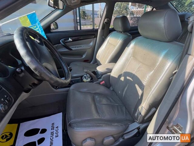 Серый Шевроле Эванда, объемом двигателя 2 л и пробегом 232 тыс. км за 4400 $, фото 10 на Automoto.ua