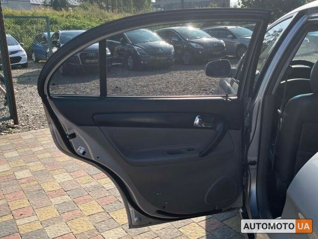 Серый Шевроле Эванда, объемом двигателя 2 л и пробегом 232 тыс. км за 4400 $, фото 12 на Automoto.ua