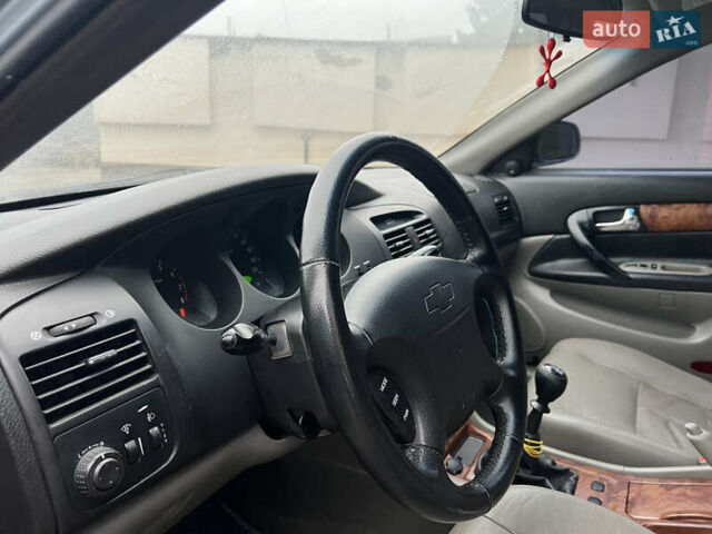 Сірий Шевроле Еванда, об'ємом двигуна 2 л та пробігом 255 тис. км за 2650 $, фото 9 на Automoto.ua
