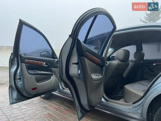 Сірий Шевроле Еванда, об'ємом двигуна 2 л та пробігом 255 тис. км за 2650 $, фото 4 на Automoto.ua