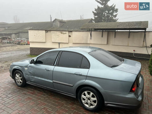 Сірий Шевроле Еванда, об'ємом двигуна 2 л та пробігом 255 тис. км за 2650 $, фото 2 на Automoto.ua