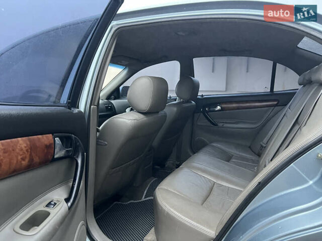Сірий Шевроле Еванда, об'ємом двигуна 2 л та пробігом 255 тис. км за 2650 $, фото 7 на Automoto.ua