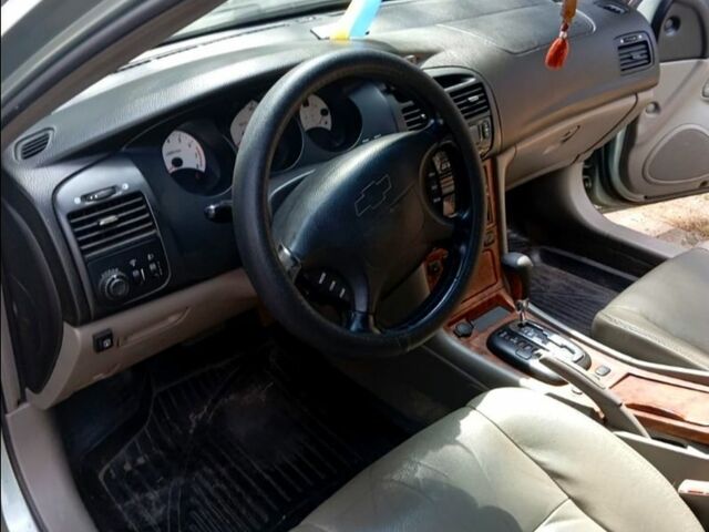 Сірий Шевроле Еванда, об'ємом двигуна 2 л та пробігом 170 тис. км за 3700 $, фото 4 на Automoto.ua