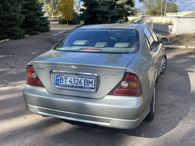 Сірий Шевроле Еванда, об'ємом двигуна 2 л та пробігом 3 тис. км за 3000 $, фото 3 на Automoto.ua