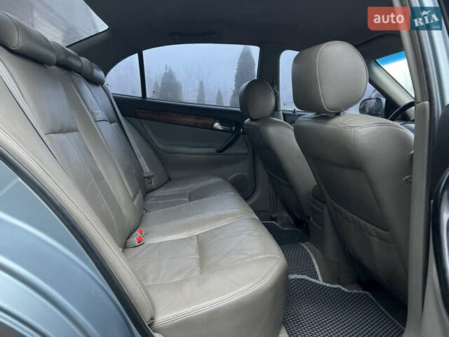 Сірий Шевроле Еванда, об'ємом двигуна 2 л та пробігом 255 тис. км за 2650 $, фото 6 на Automoto.ua