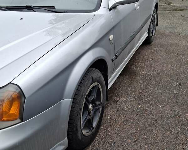 Сірий Шевроле Еванда, об'ємом двигуна 2 л та пробігом 324 тис. км за 2800 $, фото 3 на Automoto.ua