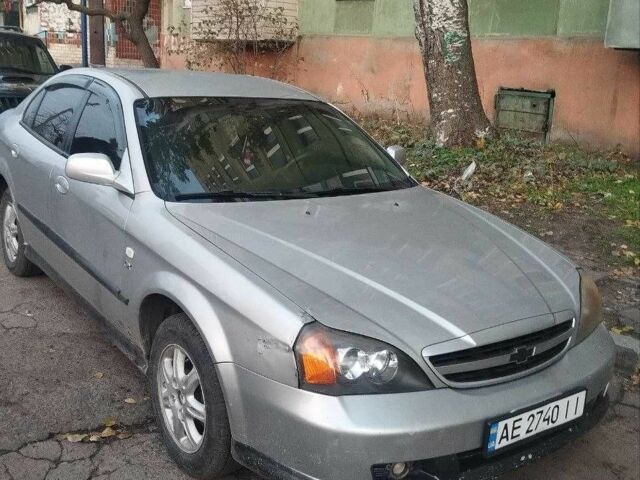 Серый Шевроле Эванда, объемом двигателя 2 л и пробегом 234 тыс. км за 2900 $, фото 1 на Automoto.ua