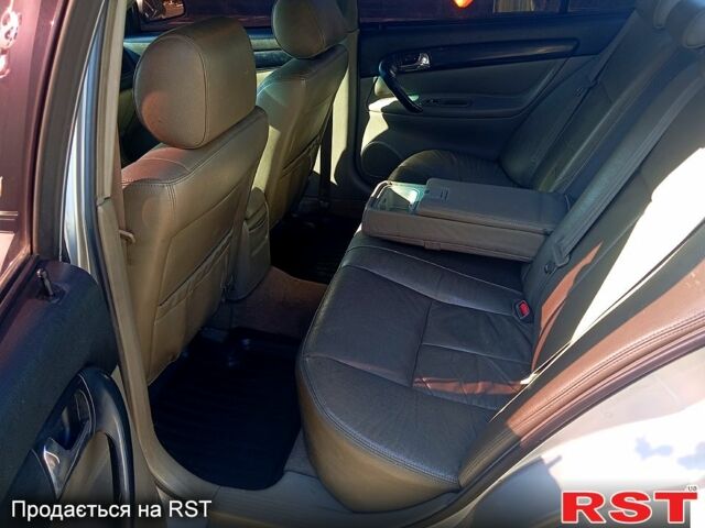 Серый Шевроле Эванда, объемом двигателя 2 л и пробегом 288 тыс. км за 3400 $, фото 8 на Automoto.ua