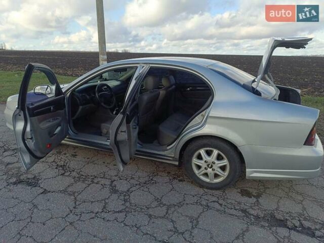 Сірий Шевроле Еванда, об'ємом двигуна 2 л та пробігом 295 тис. км за 3500 $, фото 6 на Automoto.ua