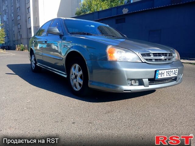 Серый Шевроле Эванда, объемом двигателя 2 л и пробегом 288 тыс. км за 3400 $, фото 2 на Automoto.ua