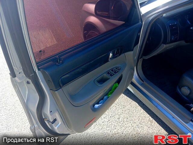 Серый Шевроле Эванда, объемом двигателя 2 л и пробегом 288 тыс. км за 3400 $, фото 7 на Automoto.ua