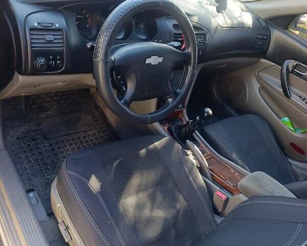 Серый Шевроле Эванда, объемом двигателя 2 л и пробегом 250 тыс. км за 2800 $, фото 1 на Automoto.ua