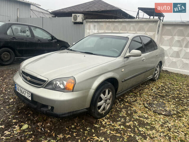 Серый Шевроле Эванда, объемом двигателя 2 л и пробегом 300 тыс. км за 3200 $, фото 7 на Automoto.ua