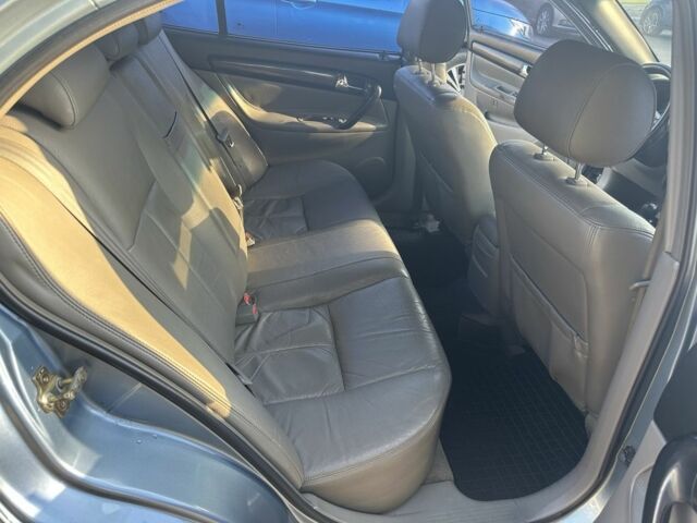 Серый Шевроле Эванда, объемом двигателя 2 л и пробегом 255 тыс. км за 2770 $, фото 10 на Automoto.ua