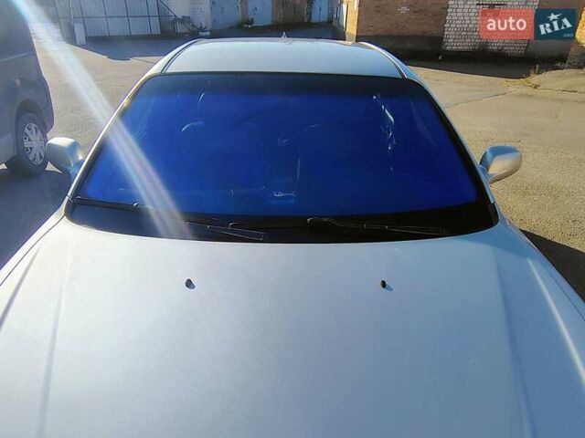 Сірий Шевроле Еванда, об'ємом двигуна 2 л та пробігом 330 тис. км за 3999 $, фото 2 на Automoto.ua