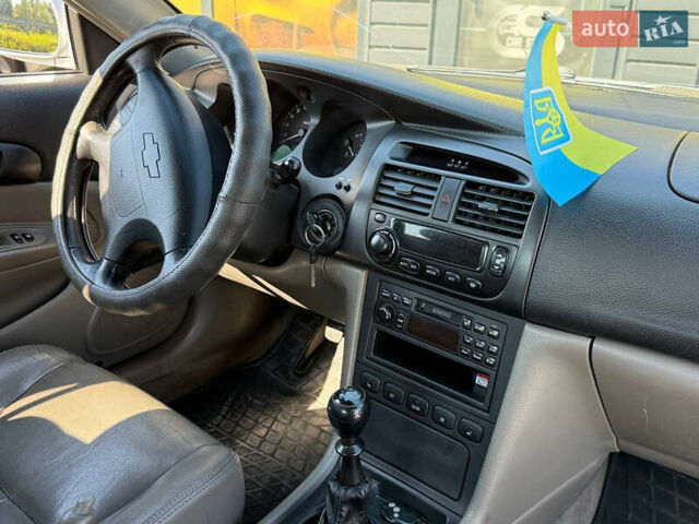 Серый Шевроле Эванда, объемом двигателя 2 л и пробегом 242 тыс. км за 3300 $, фото 21 на Automoto.ua