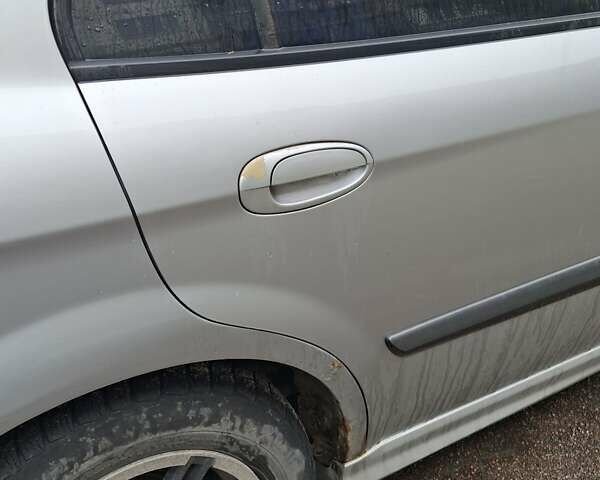 Сірий Шевроле Еванда, об'ємом двигуна 2 л та пробігом 324 тис. км за 2800 $, фото 6 на Automoto.ua