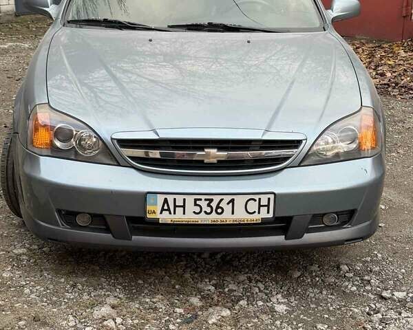 Сірий Шевроле Еванда, об'ємом двигуна 2 л та пробігом 173 тис. км за 3800 $, фото 10 на Automoto.ua