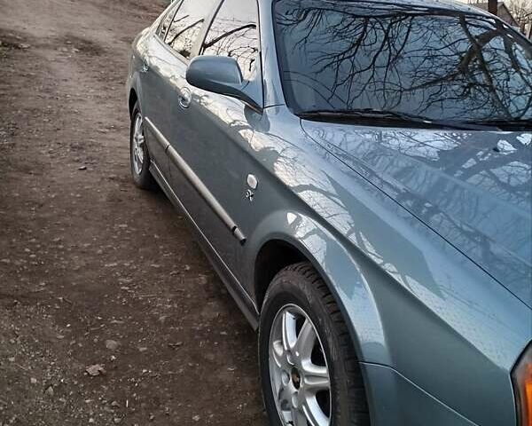 Серый Шевроле Эванда, объемом двигателя 2 л и пробегом 157 тыс. км за 4600 $, фото 7 на Automoto.ua