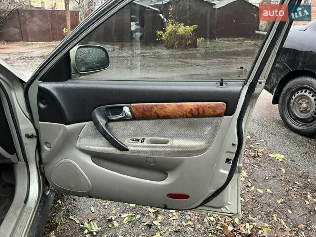 Серый Шевроле Эванда, объемом двигателя 2 л и пробегом 300 тыс. км за 3200 $, фото 9 на Automoto.ua