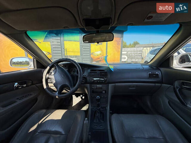 Серый Шевроле Эванда, объемом двигателя 2 л и пробегом 242 тыс. км за 3100 $, фото 3 на Automoto.ua