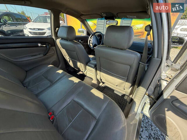 Серый Шевроле Эванда, объемом двигателя 2 л и пробегом 242 тыс. км за 3300 $, фото 26 на Automoto.ua