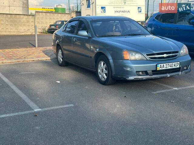 Сірий Шевроле Еванда, об'ємом двигуна 2 л та пробігом 255 тис. км за 2600 $, фото 3 на Automoto.ua