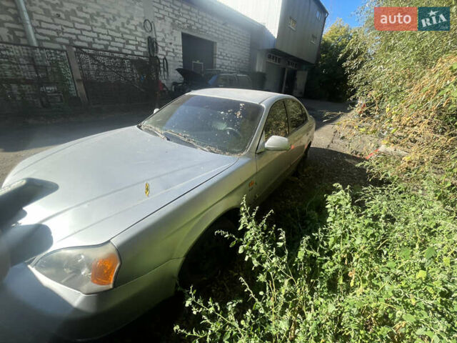 Серый Шевроле Эванда, объемом двигателя 2 л и пробегом 300 тыс. км за 1300 $, фото 2 на Automoto.ua