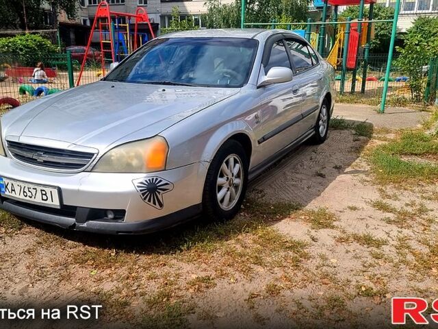 Серый Шевроле Эванда, объемом двигателя 2 л и пробегом 344 тыс. км за 3800 $, фото 3 на Automoto.ua