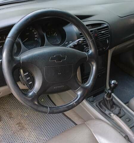 Серый Шевроле Эванда, объемом двигателя 2 л и пробегом 250 тыс. км за 3600 $, фото 2 на Automoto.ua